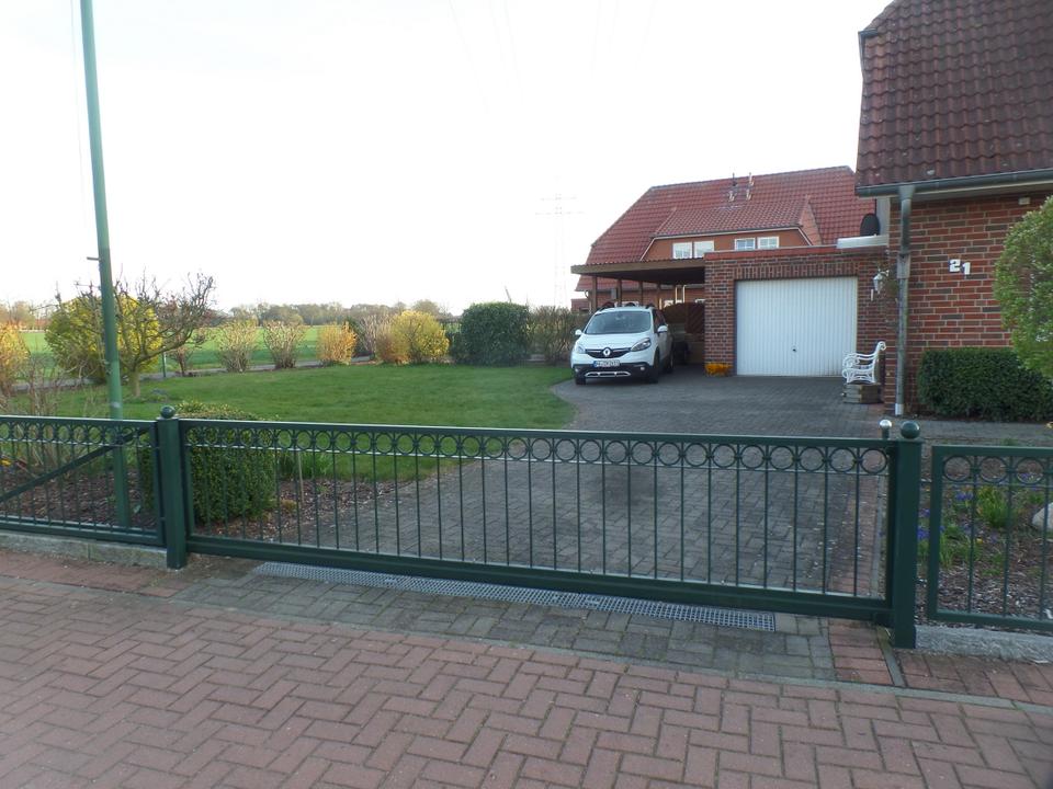 gepflegte , moderne DHH nähe Schulzentrum mit Garten, Garage, Geräteraum, Carport – Foto 3